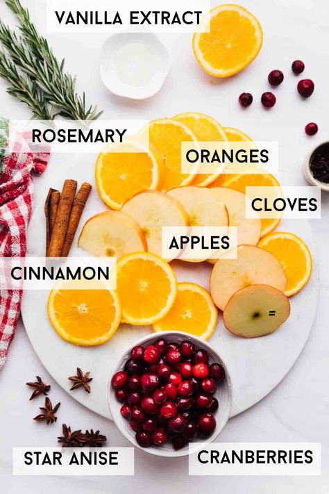 Create a holiday home with this Christmas simmer pot blend. This safe and toxic-free stovetop potpourri will infuse the air with a warming December scent. You can use this Christmas simmer pot every day for several days. - #christmassimmerpot #simmerpot #holidaypotpourri #christmaspotpourri Christmas Pot Simmer Recipe, Scent Pot On Stove Christmas, House Simmer Pot, Drying Fruit For Simmer Pot, Christmas In A Pot, Simmer Pot Christmas Recipes, Crockpot Smell Good Home Christmas, Freeze Dried Simmer Pots, Potpourri In Crockpot