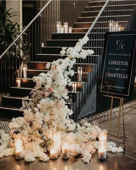 Staircase Wedding Decoration, Staircase Floral Installation, Stairs Decoration With Flowers, Disco Ball Wedding Florals, Floral Staircase Decor, Wedding Flowers Staircase, Staircase Florals Wedding, Staircase Floral Decor, Flowers On Staircase