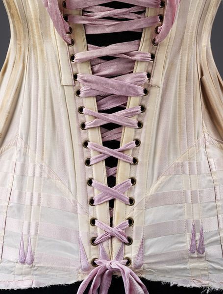 Corset | 1908-1910 (made) period. Backside, close- up of lacing details. Purple lacing. Boning. Antique corset, lingerie, undergarments. Corset Editorial, Historic Corset, Corset Fastening, Antique Corset, Corset Inspiration, Corset Details, Corset Lacing, Tea Gown, 1910s Fashion