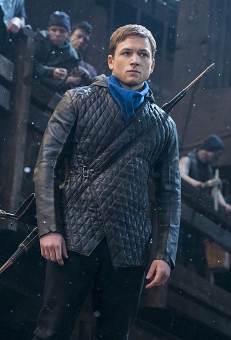 A new trailer for the upcoming Robin Hood film has just been released with Taron Egerton starring as Sherwood Forest’s arrow-carrying vigilante. And while many of us are still wondering why we need a new adaptation of the story, we make the trailer Lionsgate’s Robin Hood one to keep an eye on. Taron Egerton Robin Hood, Taron Egerton Kingsman, Leather Jacket Hoodie, Hood Wallpapers, Quilted Leather Jacket, Black Leather Coat, Taron Egerton, Famous Movies, Jackets Men Fashion