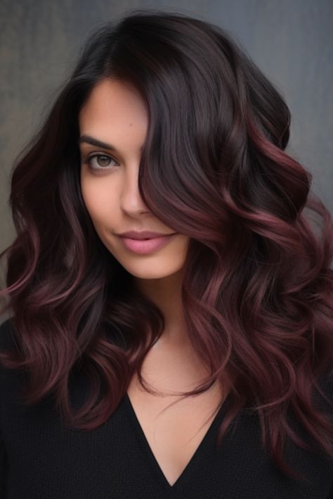 Deep burgundy balayage on dark hair is a rich and lush option for people seeking a drastic color change. This style is perfect when you want a supple balayage for your dark hair. Click here to check out more gorgeous balayage for dark hair ideas. Dark Hair To Red Balayage, Red Burgundy Balayage Hair, Hair Color Changes For Dark Hair, Brown Hair Burgundy Balayage, Dark Brown Burgundy Hair Balayage, Cherry Coke Balayage Dark Brown, Burgundy Balayage On Brown Hair, Hair Styles For Dark Brown Hair, Burgundy Bayalage Hair Dark