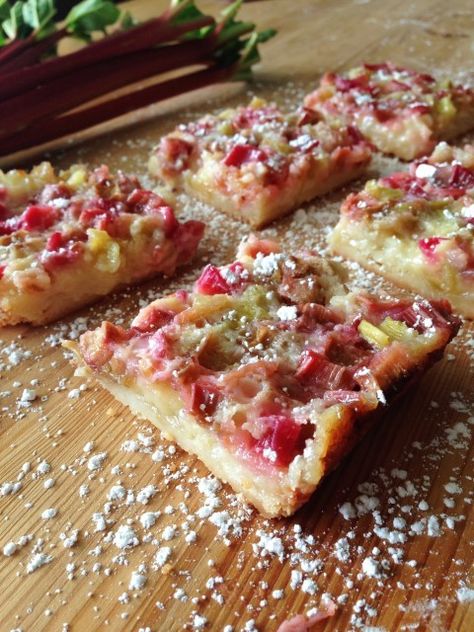 Deliciously tangy, sweet rhubarb bars with a sweet shortbread crust. Rhubarb Bars Recipes, Best Rhubarb Recipes, Rhubarb Bars, Rhubarb Tart, Rhubarb Desserts, Rhubarb And Custard, Dessert Aux Fruits, Spring Desserts, Shortbread Crust