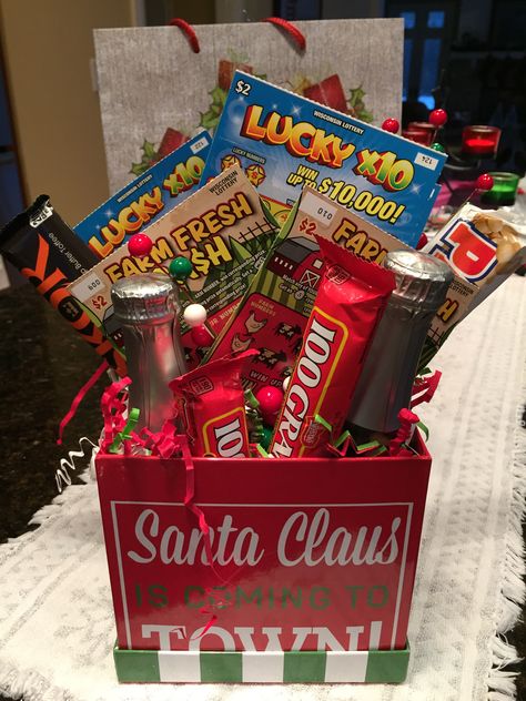 Lottery Ticket Secret Santa gift. Added little champagne bottles and candy bars. Lottery Ticket Ideas For Christmas, White Elephant Lottery Tickets, Candy Lottery Ticket Bouquet, Lotto Tickets Christmas Gift, Cute Lottery Ticket Gift Ideas, Christmas Scratcher Gift Ideas, Lottery Ticket Bouquet Christmas, Scratchers Christmas Gift Ideas, Kris Kringle Gift Ideas Secret Santa