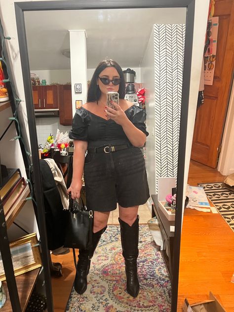 Woman taking mirror selfie in black boots, black shirt, black DIY shorts Black Jean Shorts Outfit Plus Size, Black Jean Shorts Outfit, Black Jeans Outfit Summer, Diy Jean Shorts, Date Inspo, Black Cowboy Boots Outfit, Nyc 2023, Cowboy Boots Outfit, Black Off The Shoulder Top