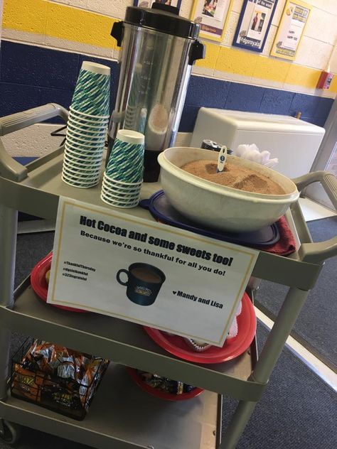 Coffee and Hot Cocoa Cart for a to-go treat for staff. Kindness Cart For Teachers, Treats For Office Staff, Coffee Cart Ideas School, Treat Trolley For Teachers, Staff Breakfast, School Coffee Cart, Teacher Coffee Bar, October Staff Appreciation Ideas, Treat Cart For Teachers