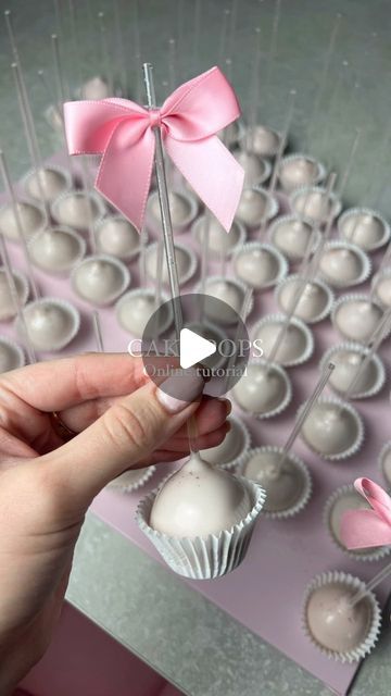 Sarah Compton on Instagram: "A new tutorial.. cake pops! Do you love cake pops? Do you struggle making them?   Over the years I’ve found them to be so tricky but with the correct guidance I can ensure your cake pops will be perfection!   Excited for this to be coming soon!🩷  #sarahscakecompany #cakepops #baking #cakeartist #cakepop #cakeonastick #luxurycakes #caketutorials #cakemaking #prettycakes #childrenscakes #partycake #cakedecorating #cakeinspiration #cakesofinstagram #cakeideas #caketips #caketutorials #cakerecipes #cakestyle #new" Gender Reveal Cake Pops Ideas, How To Display Cake Pops, Cake Pop Packaging Ideas, Cakepops Ideas Decoration, Wedding Cake Pops Ideas, Cake Pop Display Ideas, Ballerina Cake Pops, Cake Pops Designs, Fancy Cake Pops