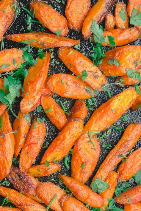 Simple Roasted Carrots Recipe | The Mediterranean Dish Mediterranean Roasted Carrots, Mediterranean Carrot Recipes, Mediterranean Carrots, Easy Roasted Chickpeas, Pasta With Onions, Carrot Dishes, Moroccan Vegetables, Carrot Recipe, Roasted Carrots Recipe