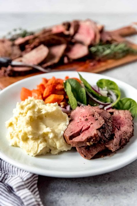 This easy Garlic & Herb Beef Tenderloin Roast with Creamy Horseradish Sauce is so delicious and easier to make than you would think! The beef tenderloin is a delectable, melt-in-your-mouth cut of meat that is tender enough to cut with a butter knife. Buttered and seasoned with garlic and black pepper, oregano, fresh rosemary and thyme, it is mouthwateringly flavorful! Paired with a homemade creamy horseradish sauce, this is a perfect main dish for the holiday season or for a special evening ... Beef Tenderloin Roast Recipes, Butter Beef, Whole Beef Tenderloin, Butter Herb, Creamy Horseradish, Slow Cooker Korean Beef, Brisket Rub, Creamy Horseradish Sauce, Christmas Main Dishes