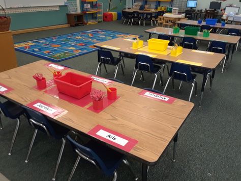 Color tables set up and ready for the First day of School. 3rd Grade Classroom Setup With Tables, Kindergarten Classroom Table Storage, Classroom Set Up With Tables, Classroom With Tables Instead Of Desks, Classroom Table Setup, Table Classroom Set Up, Preschool Table Set Up, Table Supplies Classroom, Kindergarten Class Set Up