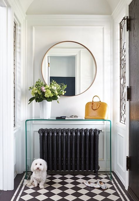 foyer, entry, black radiator, lucite console table, white walls, checkerboard floor Checkered Floor, Glass Waterfall, Marble Shelf, Checkerboard Floor, Foyer Decorating, Beautiful Cabinet, Radiator Cover, Entryway Decor, White Walls