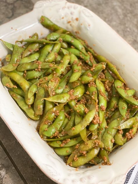 This super easy edamame recipe is so good! I wanted to mimic something from our local sushi restaurant and nailed it! Can be a spicy garlic edamame or just garlic edamame recipe. It's up to you how you do garlic edamame recipe spicy or even chili garlic edamame with just a few ingredients. Best is it's low carb and keto friendly. Garlic edamame recipe simple with step by step instructions. garlic edamame recipe soy sauce and ra sushi garlic edamame! Plus easy spicy garlic edamame and   how to ma Garlic Edamame Recipe Soy Sauce, Garlic Edamame Recipe, Spicy Garlic Edamame, Edamame Recipes Spicy, Edamame Recipe, Edamame Recipes, Protein Goals, Picky Toddler Meals, Vegetarian Meals For Kids