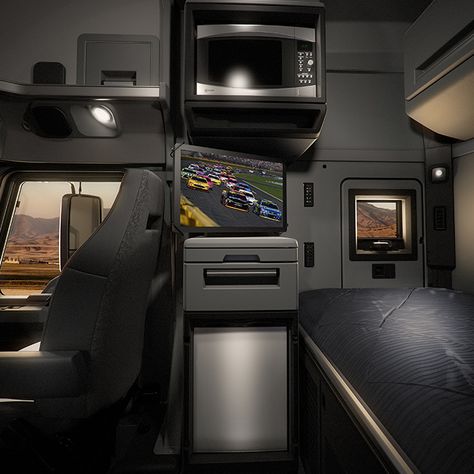 Profile view of the Anthem 70" Stand Up Sleeper interior environment with microwave, television, refrigerator and sleeper bunk. Trucker Hacks, Tesla Semi Truck, Semi Trucks Interior, Old Mack Trucks, Vip Design, Truck Living, Interior Environment, Tactical Truck, Luxury Motorhomes