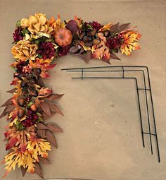 DIY Fall Door Decor - Decorate your front door with festive fall decor. All items can be purchased at the dollar store which means this project is gorgeous and budget friendly. #fallporchdecordiy #diy #cheap #rustic #porch #frontdoor #fall #autumn #seasonaldecor #decorations #hanger #display #wreaths #diy #frontporches Corner Wreaths Diy, How To Make An Autumn Garland, Dollar Tree Fall Decor Ideas Front Porch, Diy Fall Porch Decor Cheap, Wreaths With Birds, Fall Door Garland Diy, Square Wreaths For Front Door, Outside Door Decor Front Entry, Easy Fall Wreaths Diy