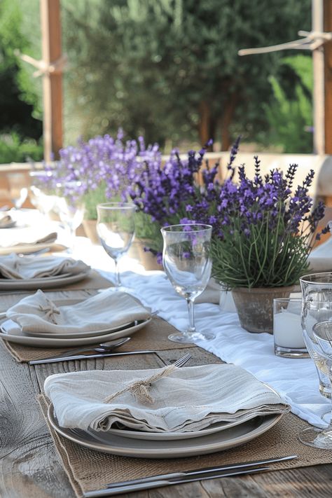 lavender summer tablescape Summer Hosting, Outdoor Hosting, Outdoor Table Decor, Summer Table Settings, Summer Tablescapes, Macrame Table Runner, Tablescape Ideas, Dinner Table Setting, Herb Pots