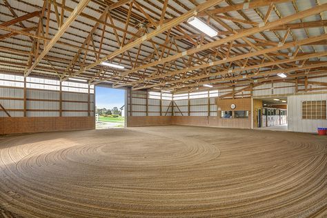 Light and bright indoor riding arena Indoor Horse Riding Arenas, Indoor Arena Exterior, Indoor Riding Arenas, Small Indoor Arena Horse, 10 Acre Horse Farm Layout, Riding Arena Indoor, Indoor Arena Horse, Indoor Horse Riding Arena, Ranch Inspiration