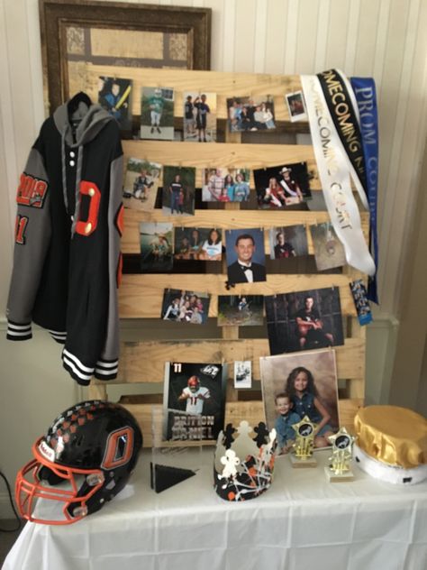 An easy way to display your senior’s accomplishments. All you need is a pallet, twine, and clothespins. Senior Board Pallet, Senior Pallet Display, Pallet Senior Picture Display, Senior Graduation Table Display Pallet, Wooden Pallet Picture Display, Senior Picture Collage Display, Wood Pallet Photo Display, Wood Pallet Graduation Display, Wood Pallet Picture Display