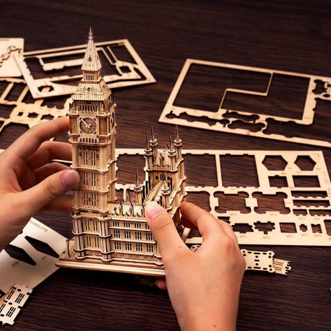 Big Ben: Set up your miniature London cityscape at home with this fun 3D laser-cut wooden puzzle project. Includes LED lights to make the finished product look even more special! • Laser-cut wood • Assembled Size: 3.9 x 4.2 x 7.5 in • Puzzle Pieces: 220 pcs 3d Wood Puzzles, London Cityscape, 3d Wooden Puzzle, Dimensional Wall Decor, Laser Cut Wood Crafts, Spring Easter Crafts, Wood Puzzles, Educational Projects, 3d Laser