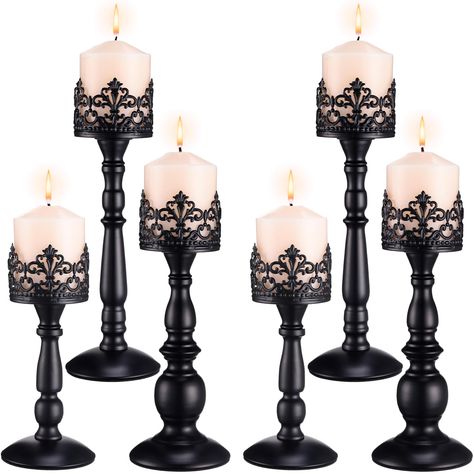 PRICES MAY VARY. Antique Design: our vintage pillar candle holders boast an antique design inspired by flowers, black texture enhances the aura of gothic, modern, country or industrial decoration; This Halloween centerpiece would undoubtedly breathe an air of sophistication into your home Varied Size Options: catering to your diverse needs, our black candlestick holders come in 3 different sizes; The first is about 4.3 inches/ 110 mm in base diameter, 11 inches/ 280 mm in height, 3 inches/ 80 mm 16 Candles Ceremony, Black Candlestick Holders, Gothic Candle, Black Centerpieces, Motorcycle Wedding, Gothic Candles, 16 Candles, Ceremony Candles, Country Wedding Decorations