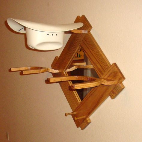 https://www.etsy.com/listing/64397295/wooden-cowboy-western-hat-rack-stand?ref=shop_home_feat Handcrafted,  beautiful crafted hat racks I have designed to keep them looking there best all the time.  This is my Unique Western Style Cowboy Hat Rack w/Mirror & pegs. It's made of Select White Pine Finished with a Min-wax Puritan Pine Stain & a Semi Gloss Polyurethane. Has a 11"x11" Mirror in the center. Cowboy Hat Rack Ideas, Hat Hanger Ideas, Wooden Hat Rack, Cowboy Hat Hanger, Wood Hat Rack, Wall Hat Rack, Display Rack Ideas, Cowboy Hat Holder, Hat Rack Ideas