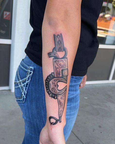 Spade Bit Tattoo, Large Western Tattoos, Western Forearm Tattoo Women, Horse Bit Tattoo, Womens Western Tattoos, Western Tooling Tattoo, Western Spine Tattoo, Spur Tattoo, Bit Tattoo