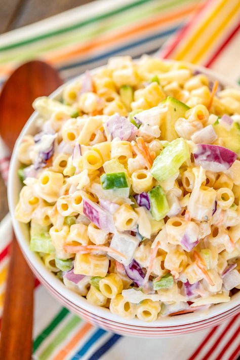 Macaroni Coleslaw - two favorites combined into one! Great make-ahead side dish for potlucks and cookouts. Pasta, coleslaw mix, onion, celery, bell pepper, zucchini, water chestnuts, Miracle Whip, sugar, cider vinegar, salt, and pepper. I never have any leftovers! SO good! #sidedish #potluck #pastasalad Pasta Coleslaw, Zucchini Water, Macaroni Coleslaw, Pepperoni Pasta, Hawaiian Macaroni Salad, Potluck Side Dishes, Savory Sides, Easy Macaroni, Macaroni Recipes