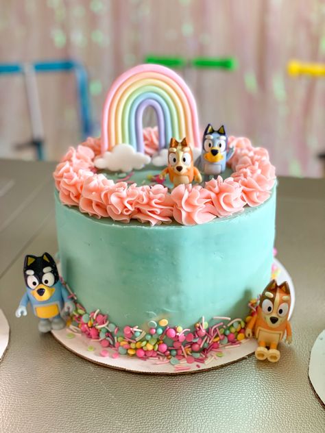 Bluey birthday cake for twins 2nd birthday! Bluey Cake Girly, Bluey Cake 1st Birthday, Bluey Birthday Cake For Twins, Number 2 Cupcake Cake Bluey, 2nd Birthday For Twins, Bluey Cake Ideas Sheet Cake, Bluey Cake With Figurines, Bluey Birthday Girly Cakes, Bluey 3rd Birthday Cake