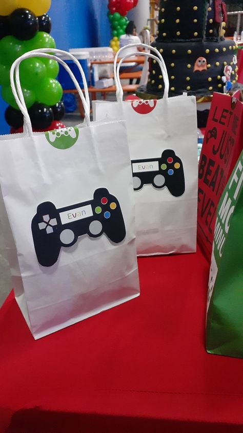 I needed extra favor bags since a few friends decided to go at last minute, so i searched for printable images, edited and printed them. Playstation Birthday, Astro Bot, Video Game Cakes, Jordan Logo Wallpaper, Video Games Birthday Party, Video Games Birthday, Birthday Bag, Party Favors For Kids Birthday, Printable Images