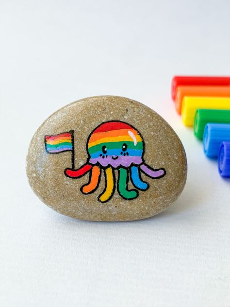 Hand painted rainbow octopus with LGBT pride flag  palm stone, funny jellyfish worry stone in LGBTQ community colors , Small lesbian girlfriend gift, LGBT get well soon gift for gay friend Pride Paintings Ideas, Stone Painting For Best Friends, Pride Rock Painting, Best Friends Painted Rocks, Octopus Funny, Small Rock Painting Ideas, Funny Jellyfish, Pride Projects, Pride Rocks