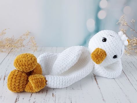 Plush lovey blanket for baby. Pattern for crochet duck lovey. Easy to crochet duck lovey pattern for beginners, crochet lovey perfect baby shower gift, US PDF pattern. PLEASE NOTE THAT THIS IS NOT A FINISHED TOY. Crochet skill level: easy. The material contains detailed instructions for creating a Crochet Duck Lovey, Lovey Blanket Crochet, Duck Snuggler, Snuggler Pattern, Duck Lovey, Duck Crochet, Crochet Duck, Duck Pins, Lovey Pattern