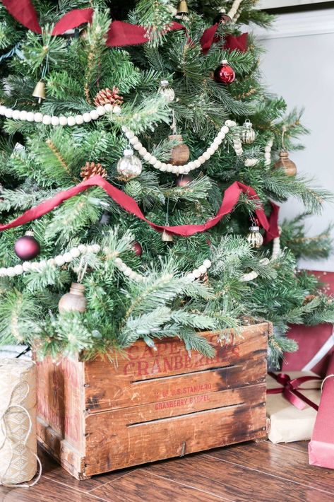 Beaded Garland Christmas Tree, Christmas Tree With Wooden Ornaments Red Berry Garland, Red Beads Christmas Tree, Wood Bead Garland Christmas Tree, Red Beaded Garland Christmas Tree, Red And Green Wood Bead Garland On Tree, Bead Garland Christmas Tree, Red And White Green Chritsmads Tree, Tree Collar