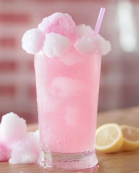 2 oz Cotton Candy Vodka, 1 oz Blue Curacao, 1 oz Lemonade, 1 oz Club Soda, Cotton candy for garnish, Sprinkles for rimming  Who else loves that nostalgic cotton candy flavor? Share your photos if you try this recipe and let’s spread the sweetness together! #CottonCandyCrush #CocktailCreation Cotton Candy Aesthetic Pastel, Chopper Aesthetic, Cotton Candy Vodka, Birthday Party Drinks, Cotton Candy Flavoring, Blue Curacao, Club Soda, Cream Soda, Party Drinks