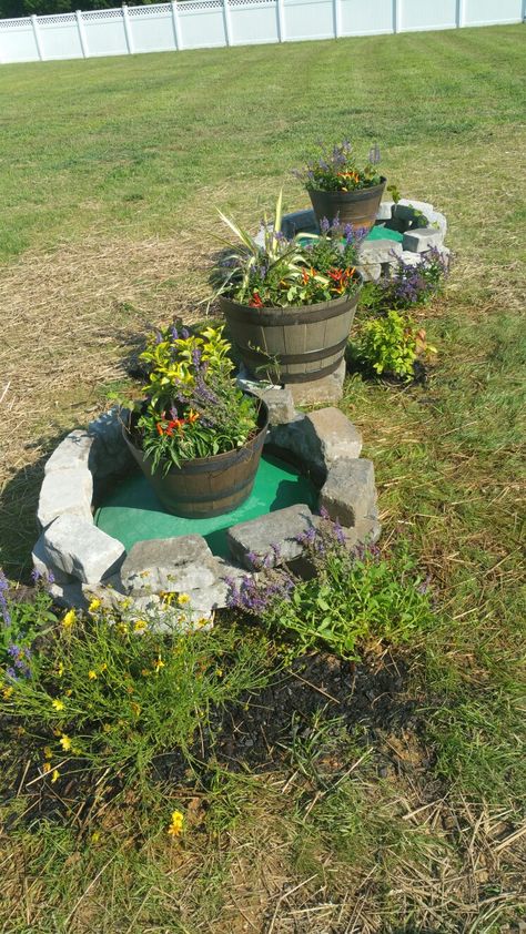 Septic Cover Ideas Outdoor, Septic Riser Cover Ideas, Ideas For Septic Tank Covers, Septic Tank Lid Cover Ideas, Hiding Septic Tank Lids, How To Cover Septic Tank Covers, Hidden Septic Tank Cover, Covering Septic Tank Lids Landscaping, Disguise Septic Tank Covers