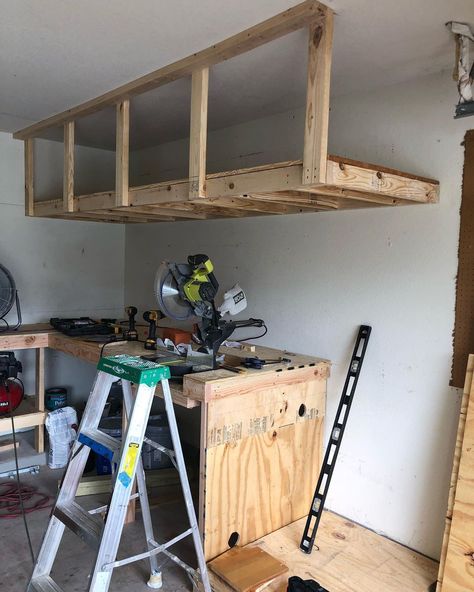 25 Innovative Garage Overhead Storage Ideas That You Will Love Diy Overhead Garage Storage Ceiling, Hang Ladder In Garage, Garage Pegboard Organization Ideas, Garage Overhead Storage Ideas, Saw Storage Ideas, Garage Shelf Ideas, Garage Storage Ideas Shelves, Shelving Ideas Garage, Garage Loft Storage