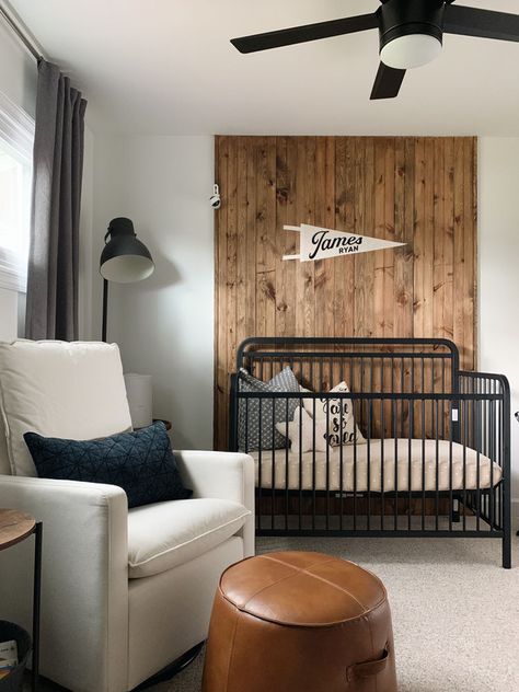 Wood Accent Nursery, Wood And Black Nursery, Black Brown Nursery, Wooden Accent Wall Nursery, Dark Brown Nursery Furniture, Little Boys Nursery Ideas, Black Dresser Nursery Baby Boy, Neutral Nursery With Black Crib, Moody Boys Nursery