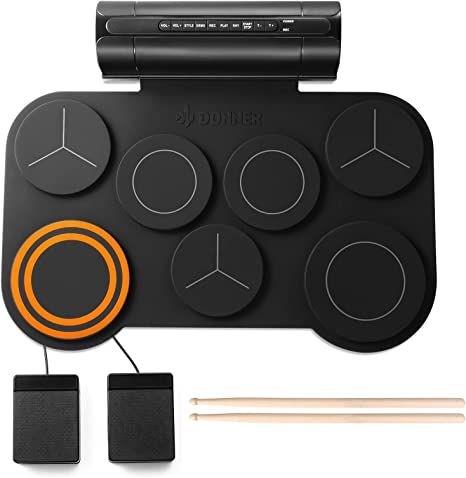 Amazon.com: Donner Electronic Drum Set, 7 Pads Electric Drum Pad Roll Up Quiet Drum Pad Built-in Speaker, 40 Drum Lessons Included, Kids Holiday Christmas & Birthday Gift Instrument Toys(DED-20) : Musical Instruments Electronic Drum Pad, Electric Drum Set, Centrifugal Juicer, Drum Pad, Drum Lessons, Printer Ink Cartridges, Kids Holiday, Electronic Drums, Kids Toy Gifts