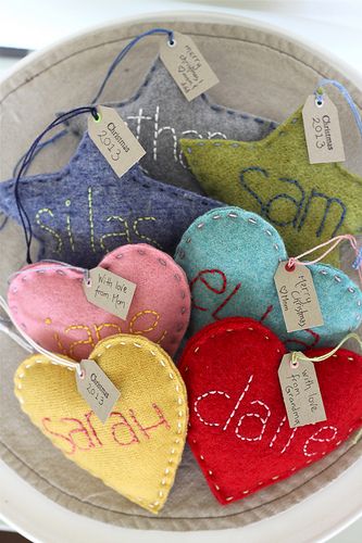 nestled together | Just opened up an Etsy shop and stocked i… | Flickr Felt Heart Ornaments, Hand Embroidered Name, Felt Star, Barn Parties, Felt Christmas Decorations, Embroidered Name, Navidad Diy, Felt Heart, Felt Christmas Ornaments