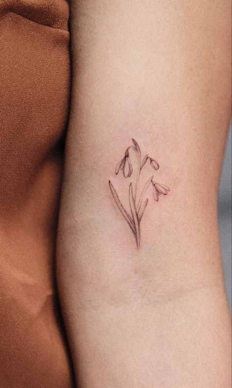 Snowdrop Wrist Tattoo, Elbow Crook Tattoo, Small Snowdrop Flower Tattoo, Snow Drop And Morning Glory Tattoo, Tiny Snowdrop Tattoo, Snowdrop Tattoo Birth Flower, Small Snowdrop Tattoo, One Line Snowdrop Tattoo, Daisy And Snowdrop Tattoo