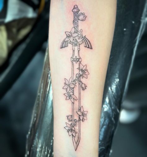 Master Sword and Silent Princess from The Legend of Zelda. First tattoo for @catrenwenn, she sat great! Thanks for looking! #tattoo #longisland #newyork #longislandtattooartist #stephenrussotattoo #newyorktattooartist #bodyartist #bodyart #art #artist #michaelangeloink #womenwithtattoos #menwithtattoos #nintendo #legendofzelda #mastersword Legend Of Zelda Triforce Tattoo, Legend Of Zelda Botw Tattoo, Master Swordsman Zelda Tattoo, The Legend Of Zelda Tattoo Ideas, Zelda Twilight Princess Tattoo, Matching Tattoos For Guys, Legend Of Zelda Tattoo Ideas, Zelda Tattoo Design, Zelda Tattoo Ideas