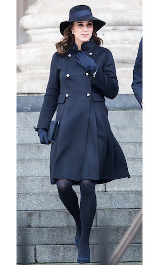 The Duchess of Cambridge opted for a demure ensemble for the Grenfell Tower national memorial service on December 14. Kate kept her baby bump under wraps wearing a double breasted double-faced wool coat by Carolina Herrera. The Duke’s wife accessorized the navy coat with matching accessories including a wide-brimmed hat, gloves, tights and her Jimmy Choo Georgia shoes.   Photo: Neil Mockford/GC Images Kate Middleton Maternity Style, Kate Middleton Stil, Moda Kate Middleton, Grenfell Tower, Expensive Outfits, Düşes Kate, Herzogin Von Cambridge, Princesse Kate Middleton, Navy Wool Coat