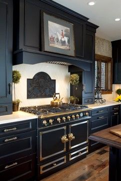 White kitchens seem to be the trend these days, but I think you'll love this fabulous collection of 10 colorful kitchens in a range of styles! Parisian Chic Interior Design, Parisian Chic Interior, Cornue Range, Parisian Style Home, Black Mantle, Moody Kitchen, Parisian Decor, Vintage Parisian, Kitchen Designer