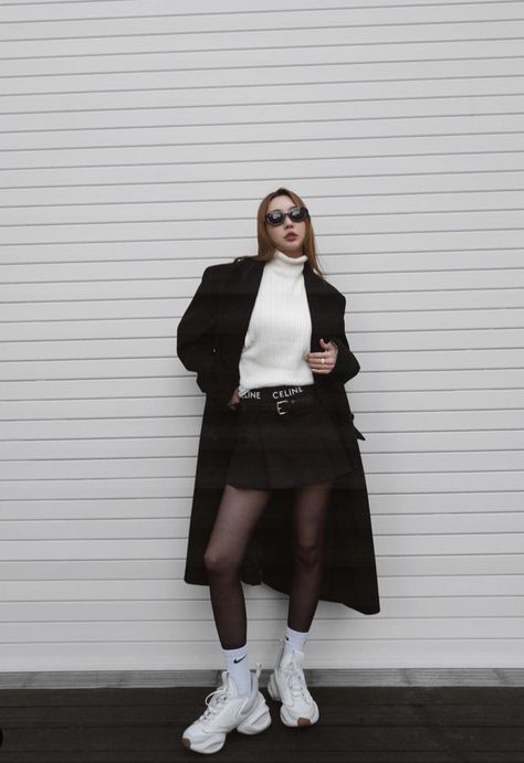 Skirt Sneakers Outfit Winter, Black Athleisure Tights For Streetwear, Edgy Black Winter Skirt, Black Knee-high Socks For Winter Streetwear, Tights And Shorts Outfit, Edgy Black Winter Tights, Edgy Thigh-high Winter Tights, Skirt With Stockings Outfit, Skirt With Stockings