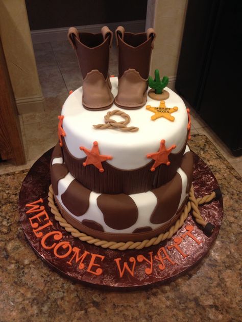 Baby shower, baby boy cake.  Fondant cowboy boots.  Western & cowboy theme. Western Baby Shower Cake, Modeling Chocolate Recipes, Cowboy Baby Shower Theme, Baby Shower Cake Ideas, Boy Shower Themes, Cowboy Cakes, Cowboy Baby Shower, Western Baby, Baby Shower Cakes For Boys