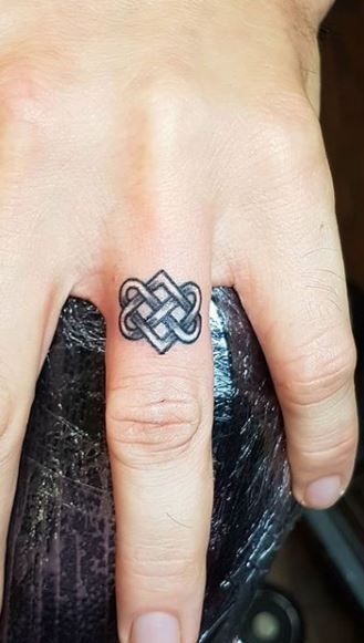 <<Check out more Celtic tattoos  #tattoomenow #tattooideas #tattoodesigns #celtic #celticknots #knots #love Celtic Infinity Knot Tattoo, Celtic Key Tattoo, Celtic Eternity Knot Tattoo, Celtic Knot Wrist Tattoo, Celtic Love Knot Ring Tattoo, Forever Knot Tattoo, Celtic Lovers Knot Tattoo, Celtic Finger Tattoos For Women, Celtic Rose Tattoo