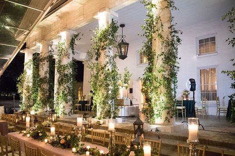 Fruit adorned the layered cake, smilax vines wrapped around the columns at Arlington Hall, and the bride carried a boa made of baby’s breath. “We really wanted the whole evening to feel like this Old World, cozy wedding at home,” bride Katie says. #DWeddings #dallasweddings #arlingtonhallevents #ivy #receptionideas #romanticreception Column Decoration Ideas, Inbal Dror Bridal, Wedding Columns, Columns Decor, Column Decoration, Outdoor Columns, Just Married Sign, Cozy Wedding, Column Design