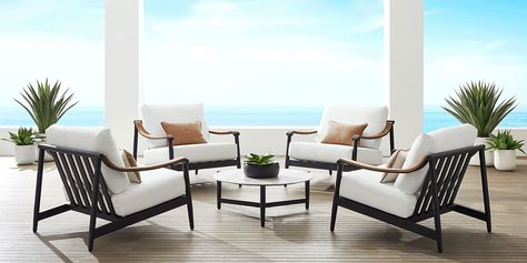 Cool, modern confidence radiates from the swooping curves of the Harlowe chat seating set from Cindy Crawford Home to create a space where connection and relaxation stretch long, long, long into the night. The deep slant of each seat promises indulgent luxury, while the tailored cushions in UV-resistant white fabric offer added support and style. Weather-resistant aluminum frames in black are accented with sloped arms topped in teak, all standing on smooth tapered legs and back posts. A large co Modern Outdoor Dining Sets, Gray Patio Furniture, Cindy Crawford Home, Colorful Patio, Outdoor Seating Set, Backyard Furniture, Outdoor Sofa Sets, King Bedroom Sets, Minimalist White