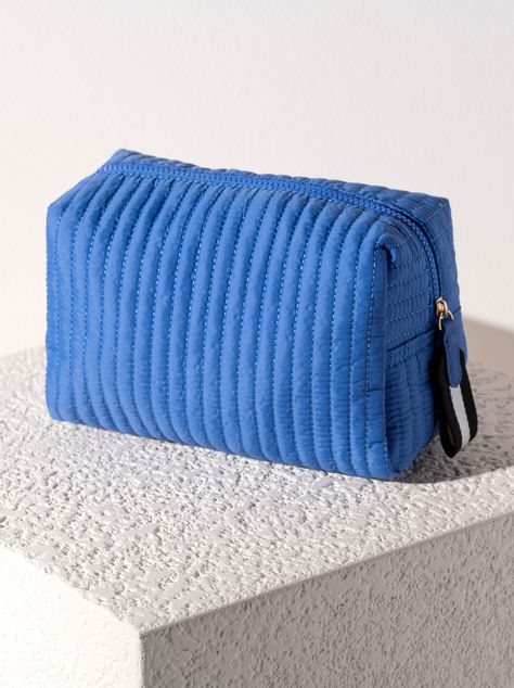 Perfect your on-the-go lifestyle with Shiraleah’s Ezra Large Boxy Cosmetic Pouch. This pouch features a quilted nylon body, and a boxy silhouette, perfectly pairing the Shiraleah’s Ezra Totes. Measuring L 9" × W 4" × H 6", and equipped with an inner zip pocket, and 2 inner slip pockets, the Ezra Cosmetic Pouch is perfect for storing your makeup, toiletries, or any odds and ends you may have. Pair with other items from Shiraleah to complete the look! Ultramarine L 9" × W 4" × H 6" Nylon Top Zip C Makeup Bag Png, Makeup Bag Ideas, Skincare Pouch, Bridal Candles, Tyler Candle Company, Barefoot Dreams Blanket, Golf Socks Women, Clear Purses, Large Cosmetic Bag