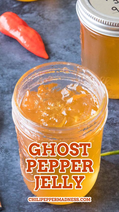 Ghost Pepper Jelly served in a big jar Candied Ghost Peppers, Strawberry Ghost Pepper Jam, Recipes Using Ghost Peppers, Ghost Peppers Recipes, Scorpion Pepper Jelly, Hot Pepper Jelly Recipe No Pectin, Sweet And Spicy Pepper Jelly, Canning Ghost Peppers, Recipes With Ghost Peppers