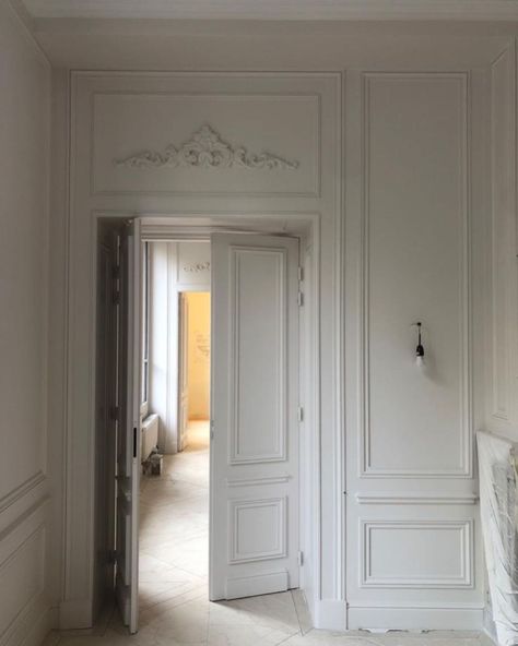 Laura Hammett on Instagram: “A peek inside our Paris project, a traditional Haussmann apartment in the heart of this beautiful city 🤍 Out client isn’t a fan of timber…” Haussmann Apartment, Parquet Versailles, Laura Hammett, Parisian Interior, Wooden Doors Interior, Classic Doors, Parisian Apartment, House Doors, Paris Apartments