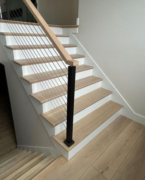 Oak Stair Treads White Risers, Stairs Vinyl Flooring, Dark Stair Treads Light Floors, Vynil Stairs Ideas, Lvp Stair Treads, Stair Transition Ideas, Lvp Stairs With White Risers, Wood Stairs With White Risers, Ravenswood Oak Coretec