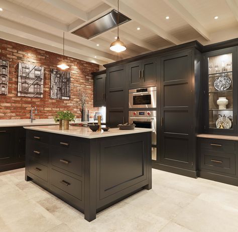 Our dusted oak internal finishes complement the ever popular paint colour Nightshade, brilliantly. When combined with the warmth and raw texture of the exposed brickwork, you're left with a stunning colour scheme that works so well. Brickwork Kitchen, Black Kitchen With Brick Wall, Grey Kitchen Brick Wall, Grey Kitchen With Brick Wall, Exposed Brick Dark Walls, Black Kitchen Exposed Brick, Kitchen Brick Wall, Exposed Brick Kitchen, Brick Wall Kitchen